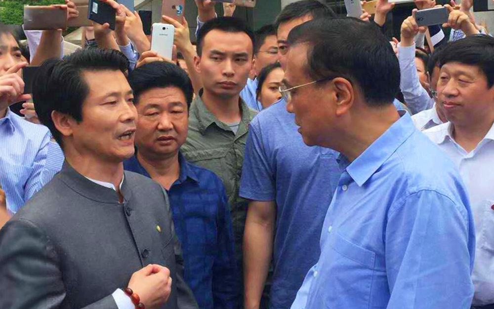 中共中央政治局常务、国务院总理李克强接见湖北恒峰g22集团主席刘雁飞